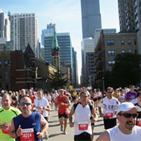 People running in city marathon