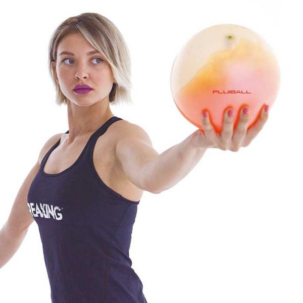 Woman holding Fluid-Filled Medicine Ball