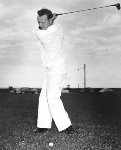 Arnold Palmer golfing
